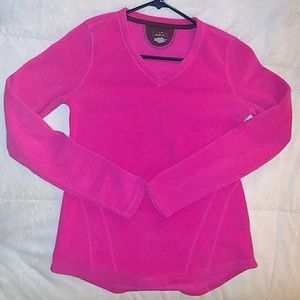 A bright pink workout long sleeve shirt